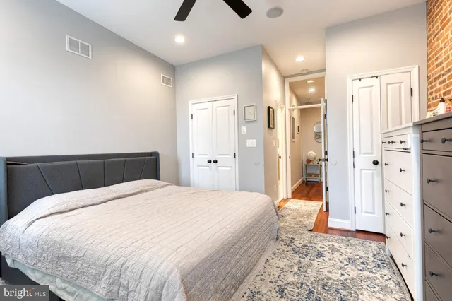 a large white bed in a white room