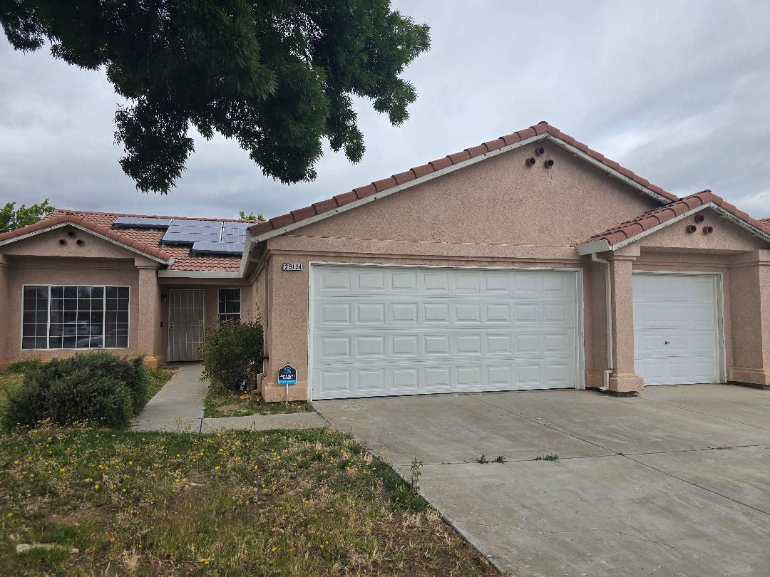 front view of a house with a garage