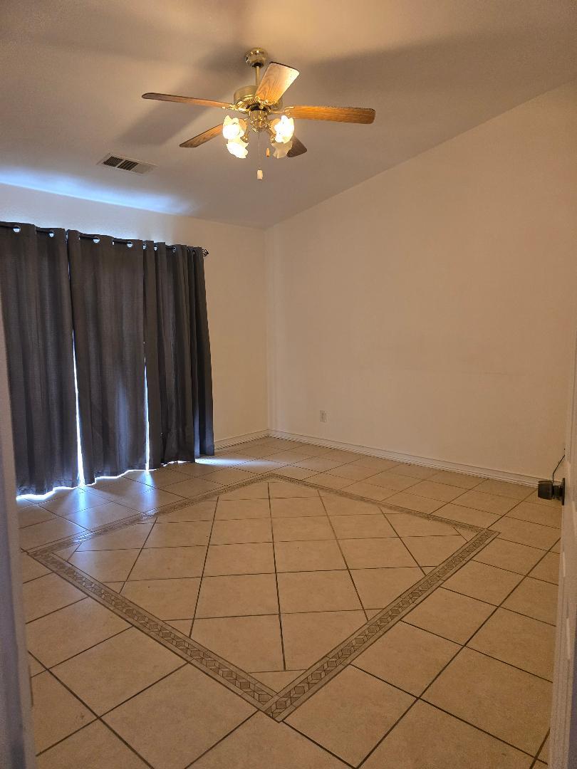 29124 Rio Verde Drive Gustine, CA 95322 - Photo 12 of 19 a view of an empty room and wooden floor