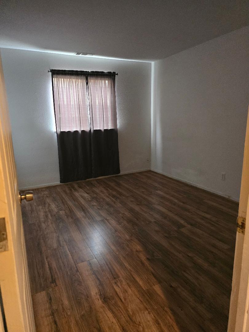 29124 Rio Verde Drive Gustine, CA 95322 - Photo 17 of 19 an empty room with windows