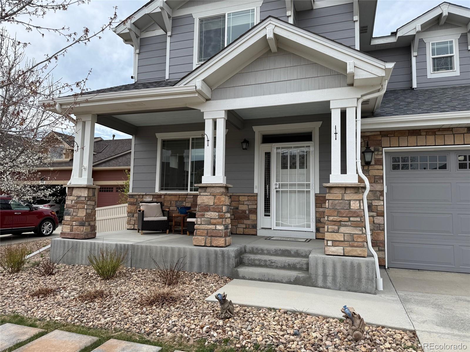 8809 Foxfire Street Firestone, CO 80504 - Photo 2 of 40 front view of a house