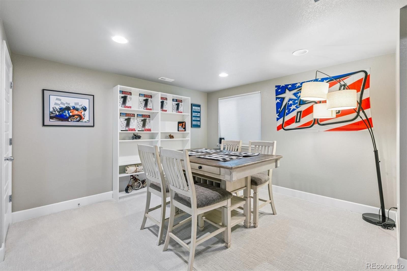 8809 Foxfire Street Firestone, CO 80504 - Photo 25 of 40 a view of a dining room with furniture