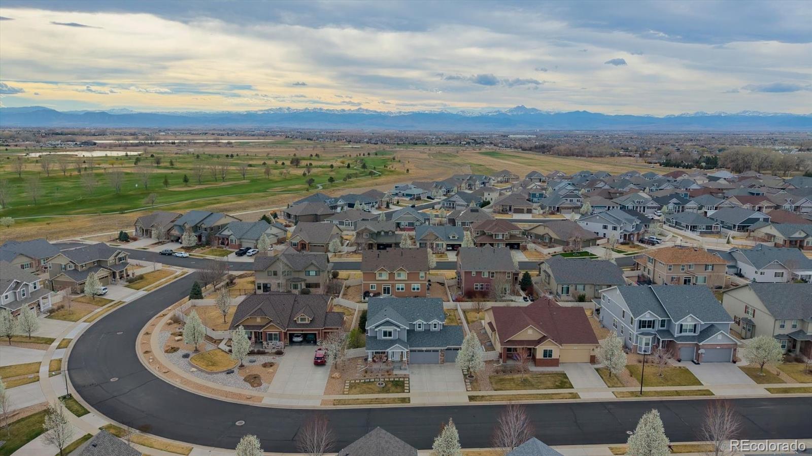8809 Foxfire Street Firestone, CO 80504 - Photo 36 of 40 an aerial view of a city with ocean view