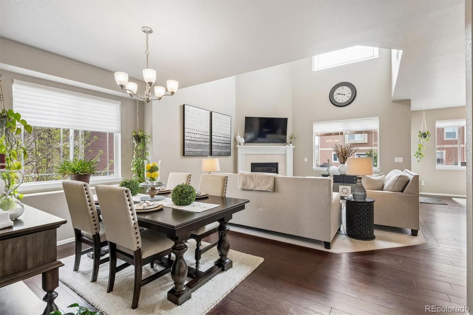 8809 Foxfire Street Firestone, CO 80504 - Photo 5 of 40 a view of a dining room with furniture window and wooden floor