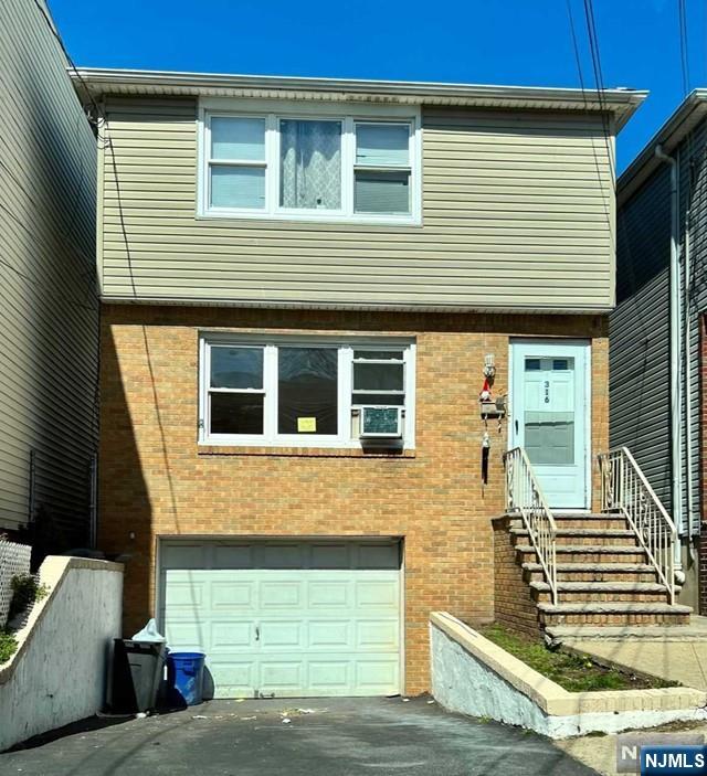 a view of a house with two windows