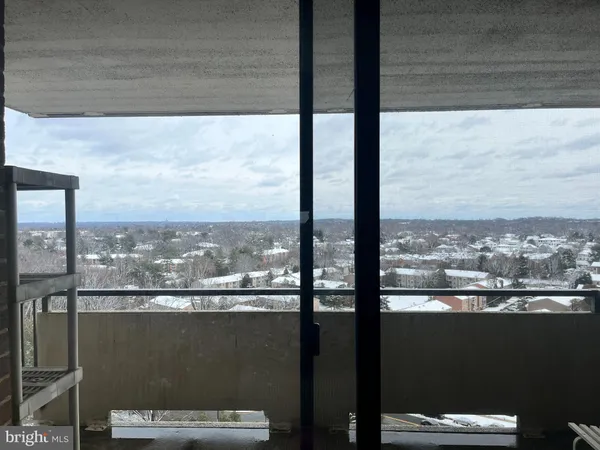 a view of a balcony with city view