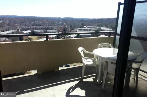 a view of a workspace with furniture