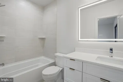 a view of a balcony with wooden floor