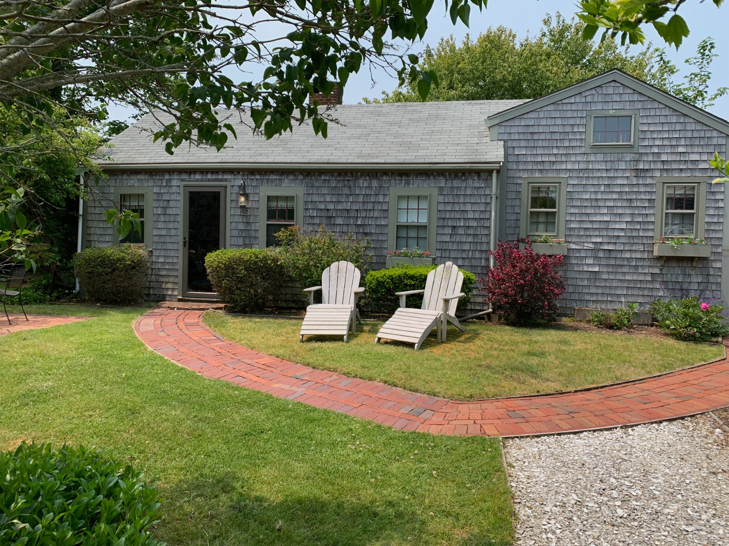 42 North Liberty Street Nantucket, MA 02554 - Photo 1 of 20 a view of a house with backyard and sitting area