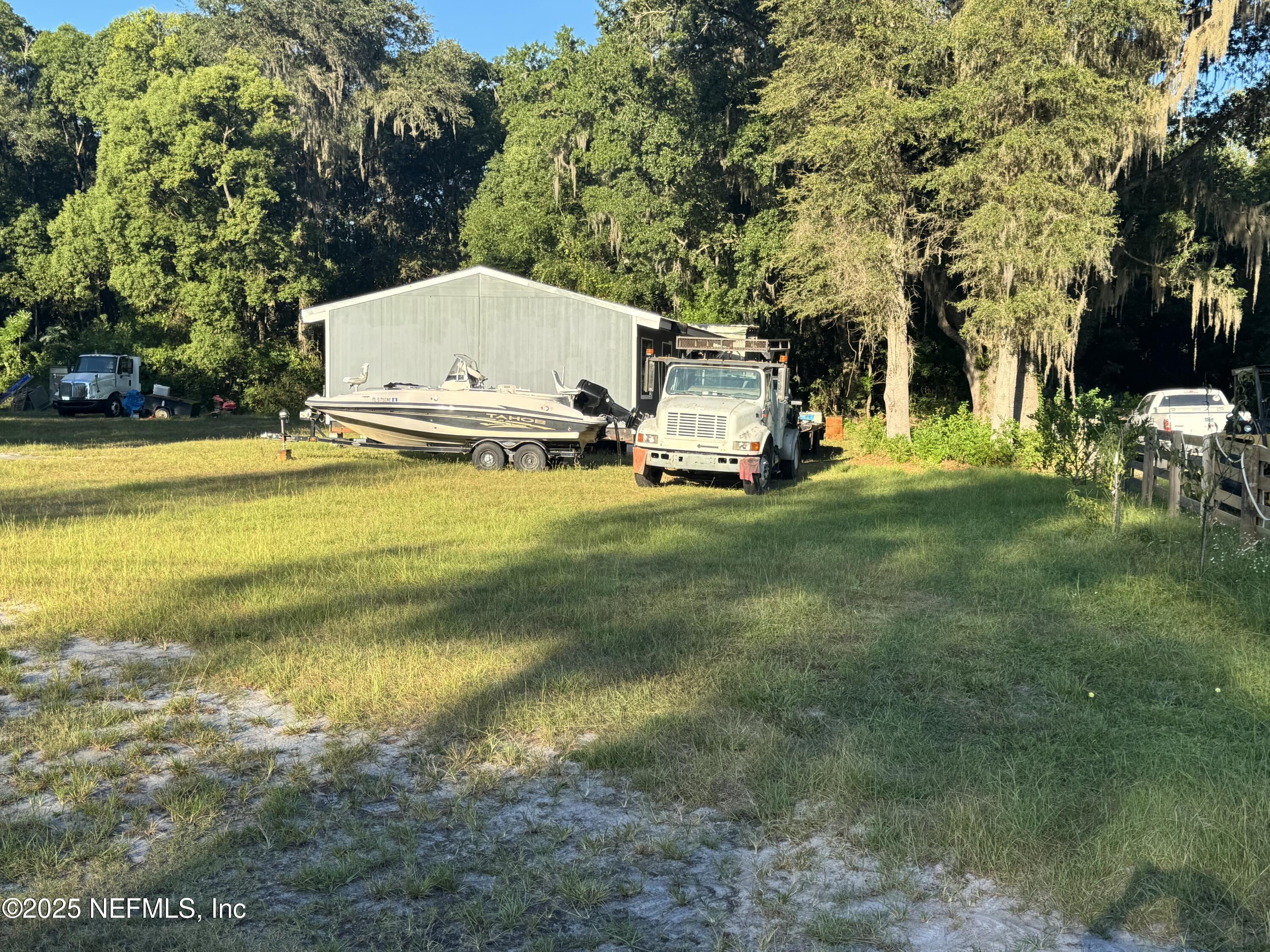 301 Northeast US Highway 301 Waldo, FL 32694 - Photo 12 of 56 a view of a house with a yard
