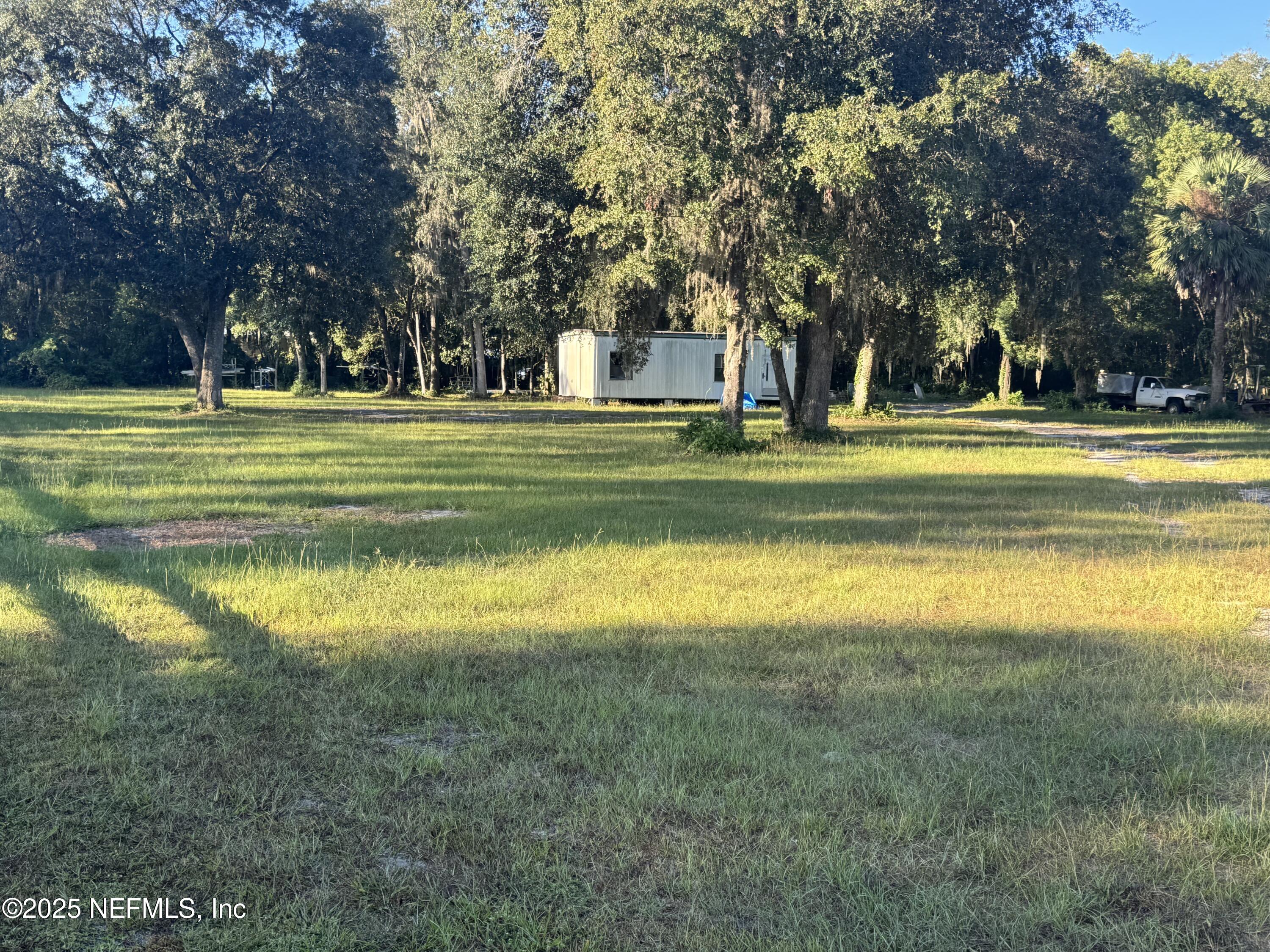301 Northeast US Highway 301 Waldo, FL 32694 - Photo 20 of 56 a huge green field with lots of trees