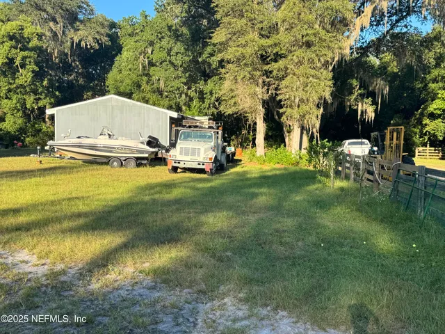 a view of swimming pool from a yard