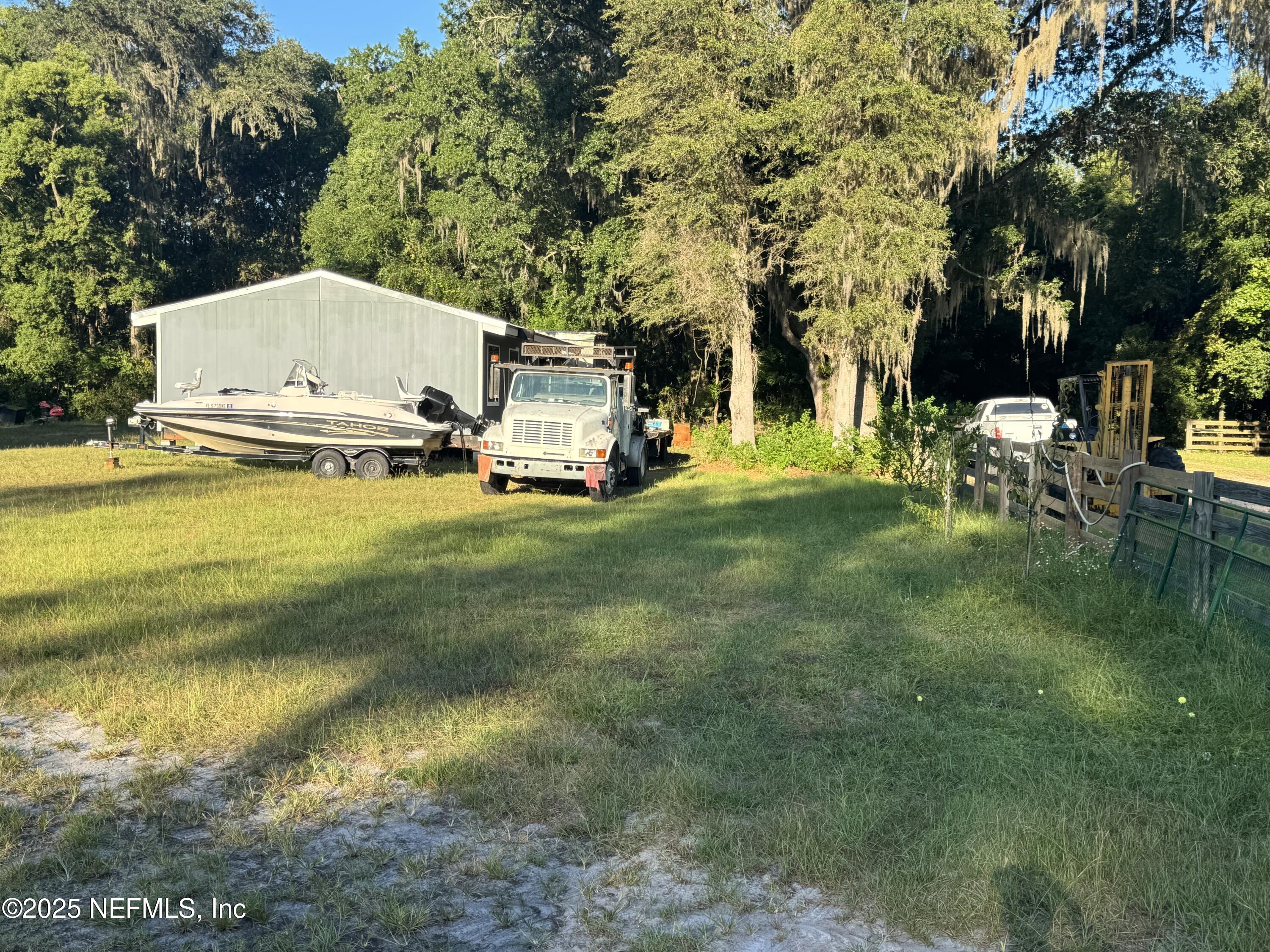 301 Northeast US Highway 301 Waldo, FL 32694 - Photo 22 of 56 a view of a house with a yard