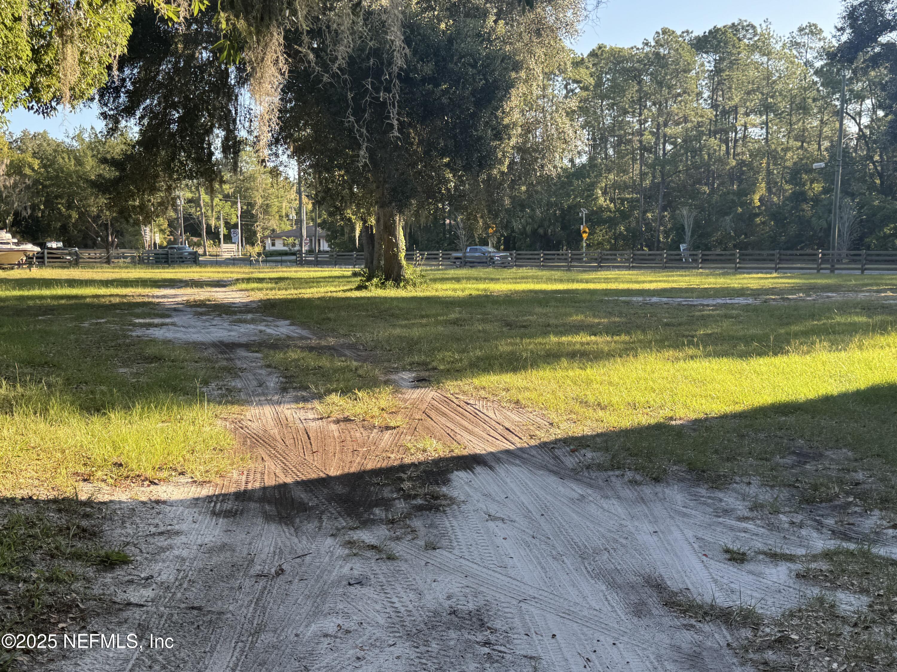 301 Northeast US Highway 301 Waldo, FL 32694 - Photo 38 of 56 a view of a swimming pool with an outdoor space and seating area