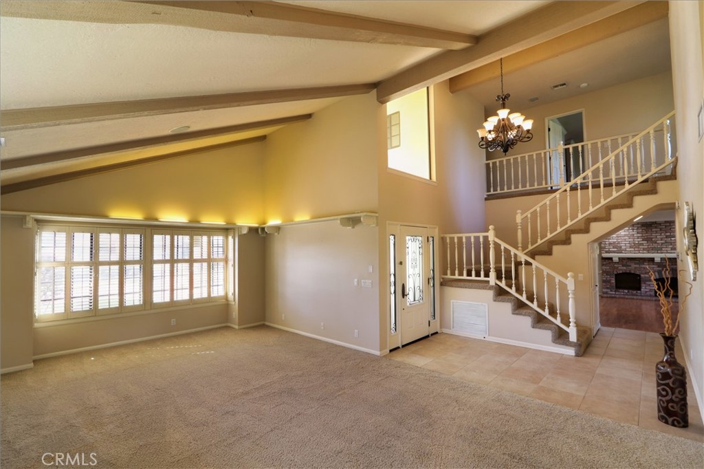 12885 Rain Shadow Road Victorville, CA 92395 - Photo 19 of 26 a view of entryway and hall with wooden floor