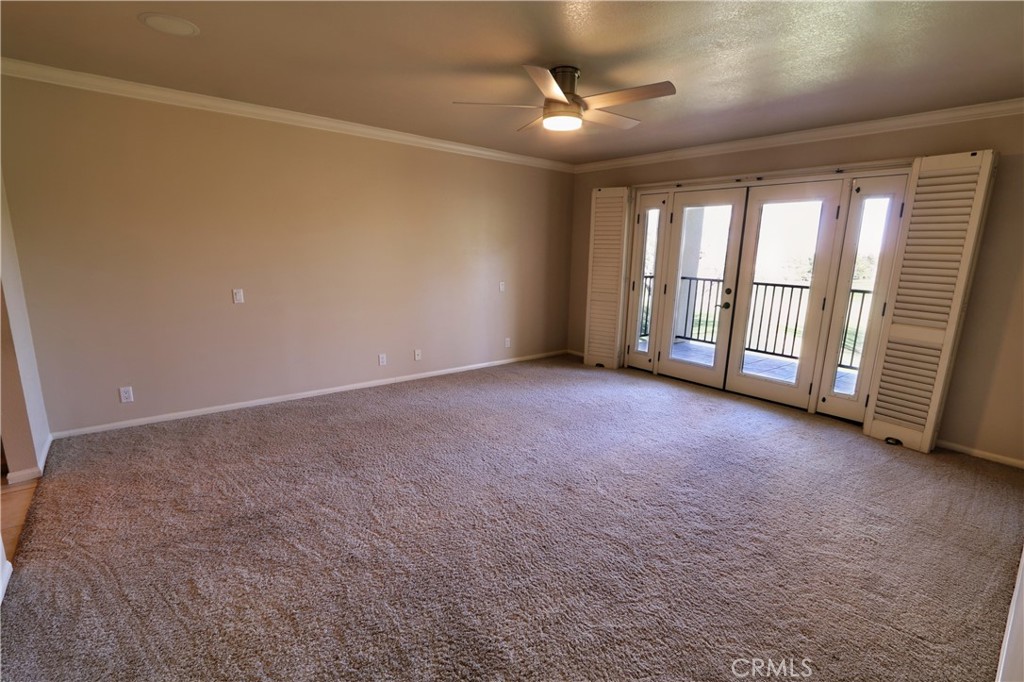 12885 Rain Shadow Road Victorville, CA 92395 - Photo 22 of 26 a view of an empty room with a window