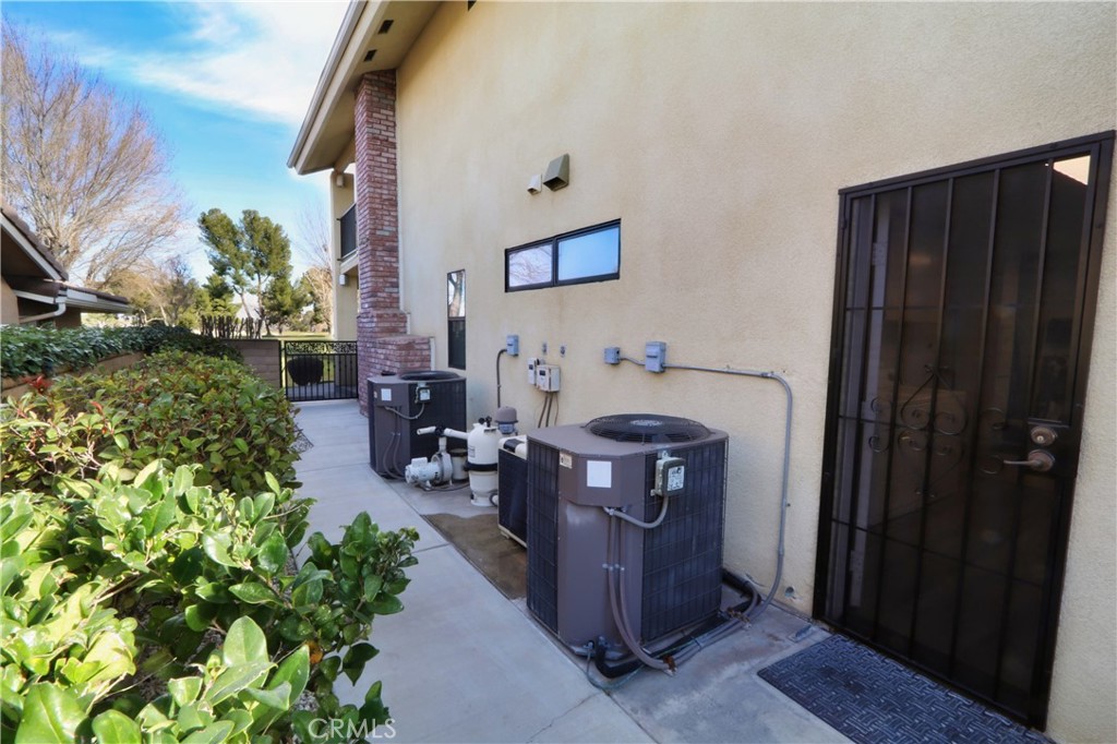 12885 Rain Shadow Road Victorville, CA 92395 - Photo 24 of 26 a view of living room with furniture and a potted plant