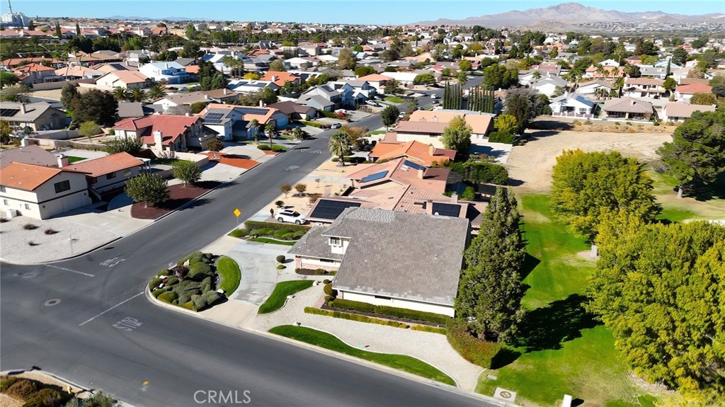 12885 Rain Shadow Road Victorville, CA 92395 - Photo 4 of 26 an aerial view of residential houses with outdoor space