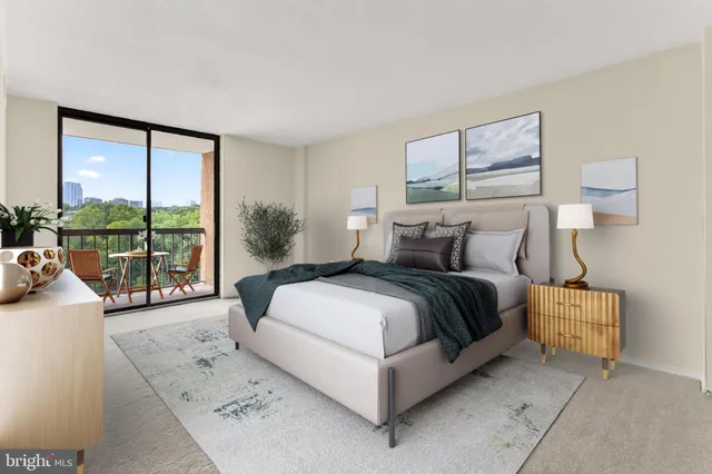 a bedroom with a bed and a large window