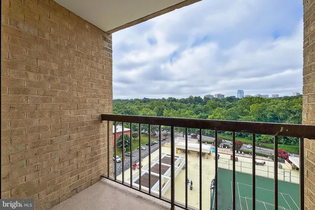 a view of a balcony with an outdoor space