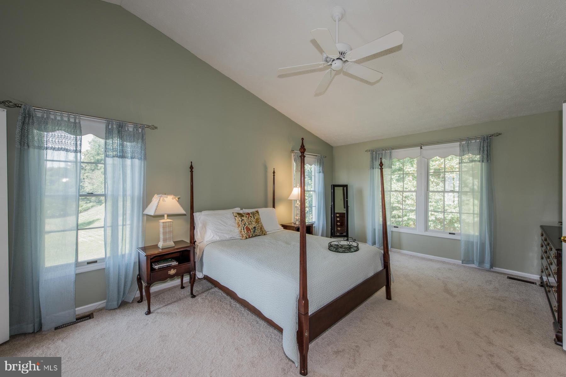 1206 Brookview Road Towson, MD 21286 - Photo 21 of 29 a large bedroom with a bed and large window