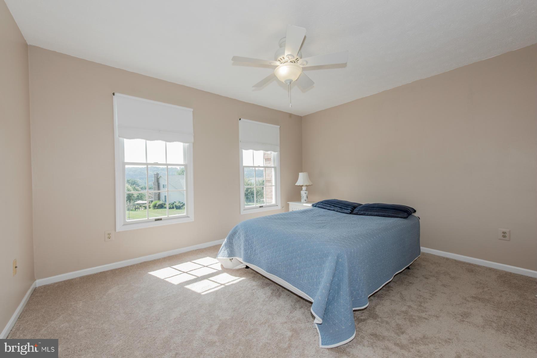 1206 Brookview Road Towson, MD 21286 - Photo 24 of 29 a spacious bedroom with a bed and a window