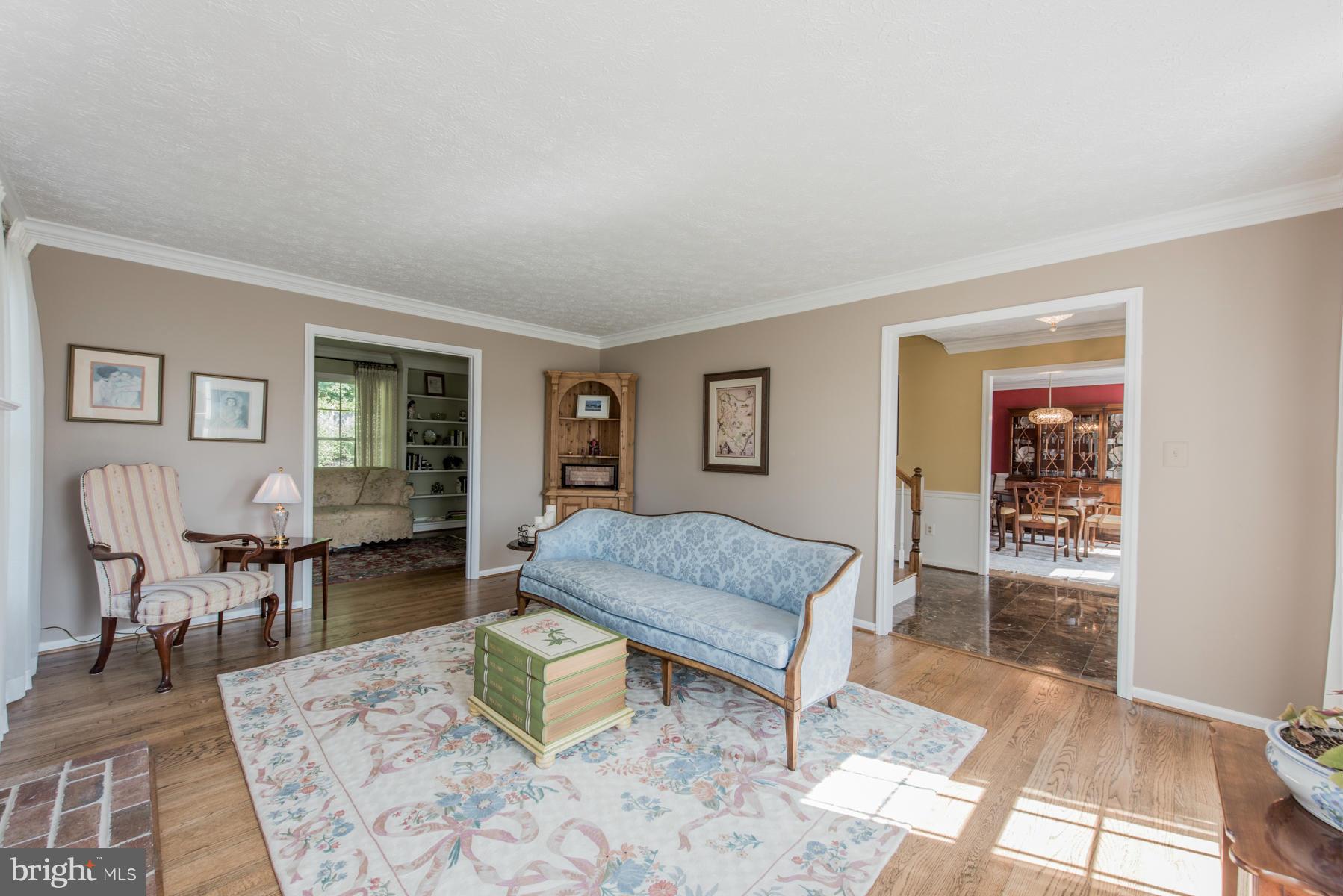 1206 Brookview Road Towson, MD 21286 - Photo 7 of 29 a living room with furniture and wooden floor