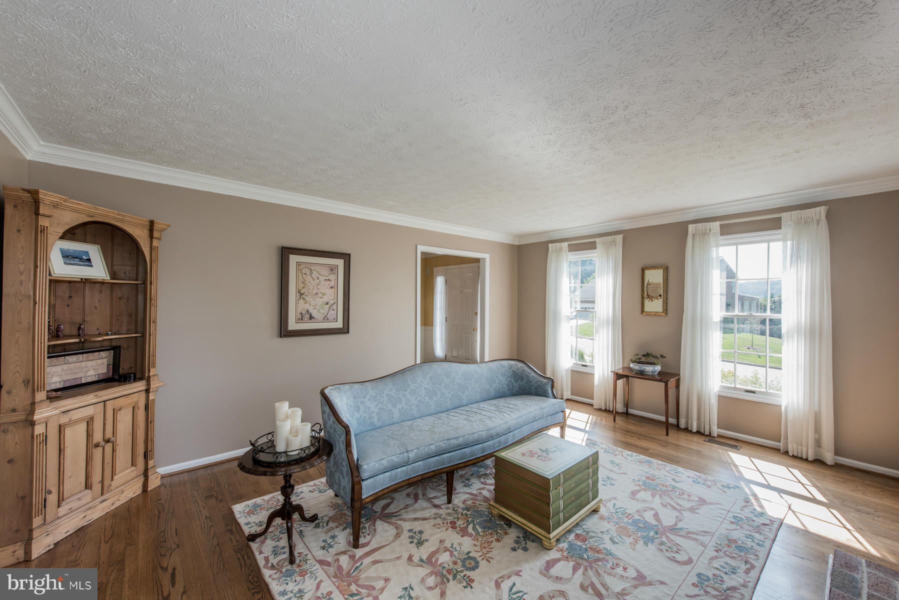 1206 Brookview Road Towson, MD 21286 - Photo 8 of 29 a living room with furniture and a window
