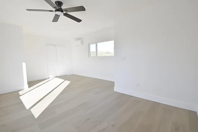 a view of a room with a window