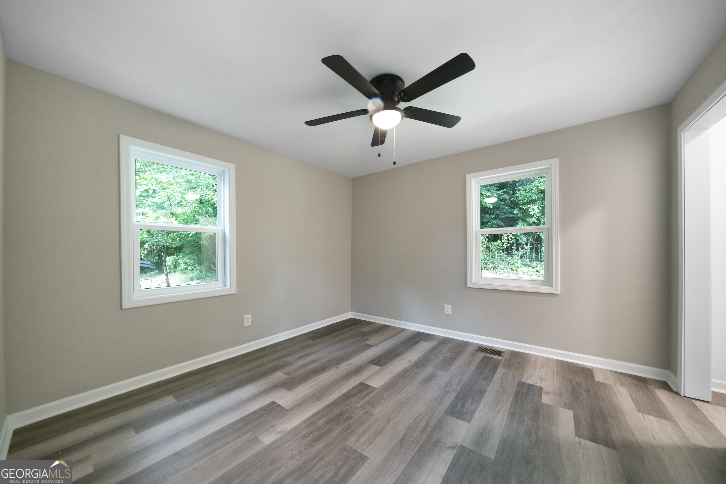 515 Harper Avenue Southwest Rome, GA 30161 - Photo 13 of 17 a view of a ceiling fan and window in a room
