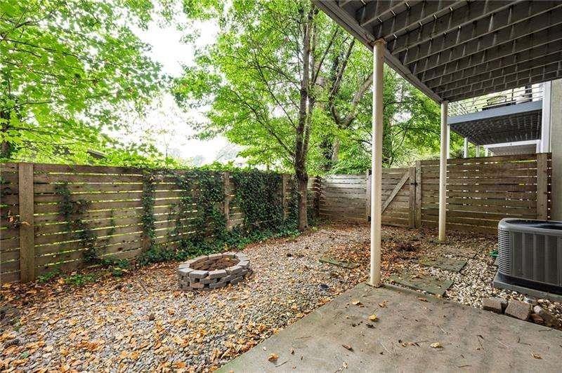 2176 Millennium Way Atlanta, GA 30319 - Photo 16 of 16 a backyard of a house with lots of green space