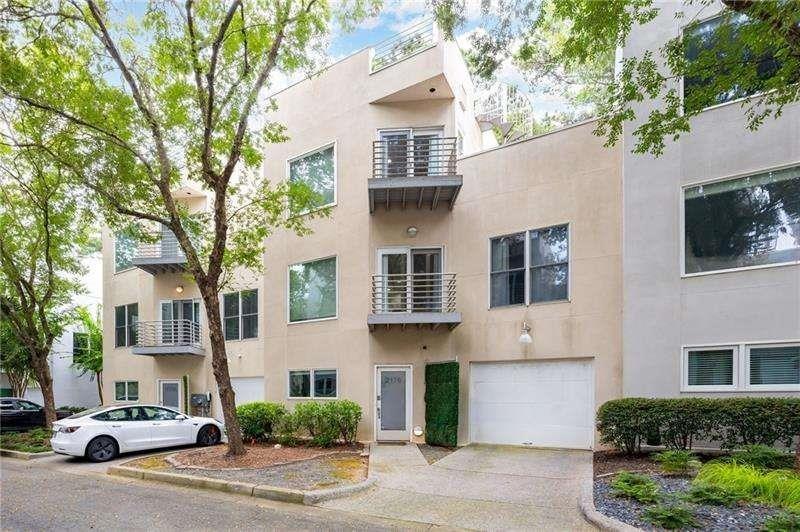 2176 Millennium Way Atlanta, GA 30319 - Photo 2 of 16 a front view of a house with a garden