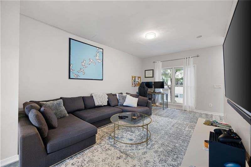 2176 Millennium Way Atlanta, GA 30319 - Photo 5 of 16 a living room with furniture and a couch