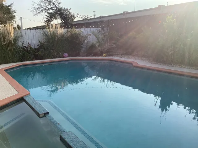 a view of a lake from a balcony