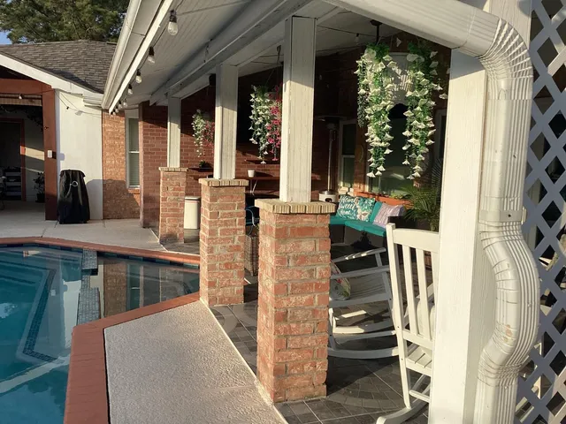a view of living room kitchen with furniture