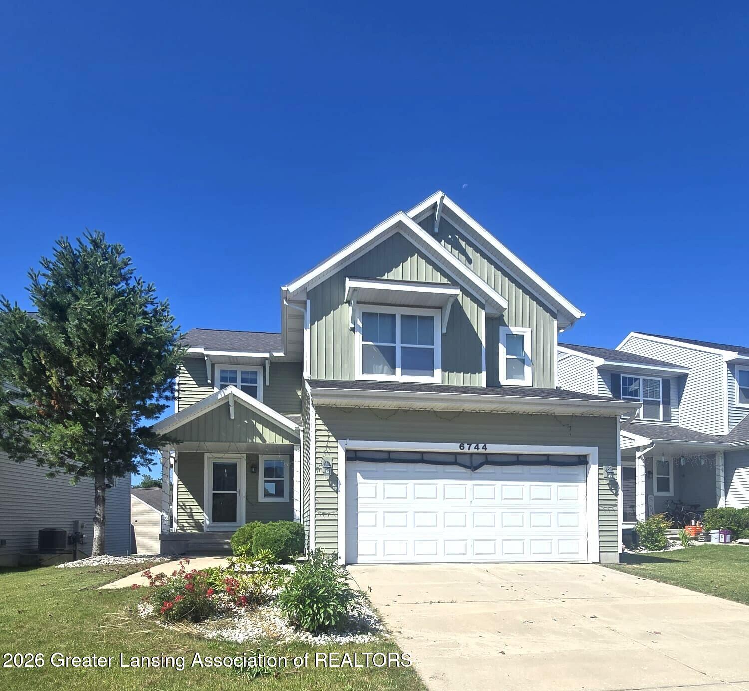 6744 Castleton Drive Grand Ledge, MI 48837 - Photo 1 of 32 front