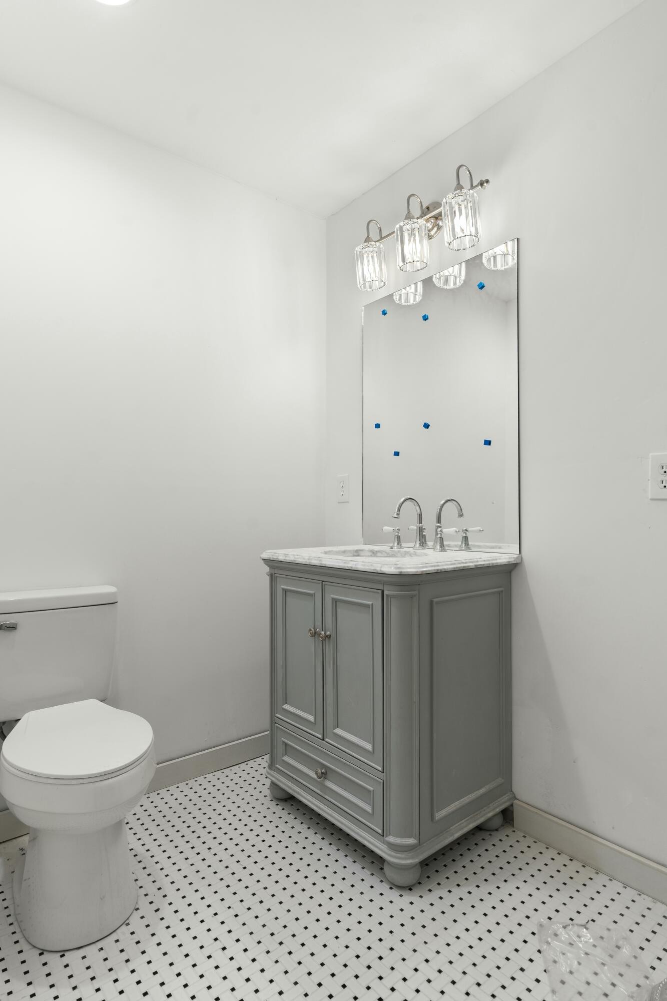 6416 Spring Place Road Southeast Cleveland, TN 37323 - Photo 21 of 28 a bathroom with a sink vanity and toilet