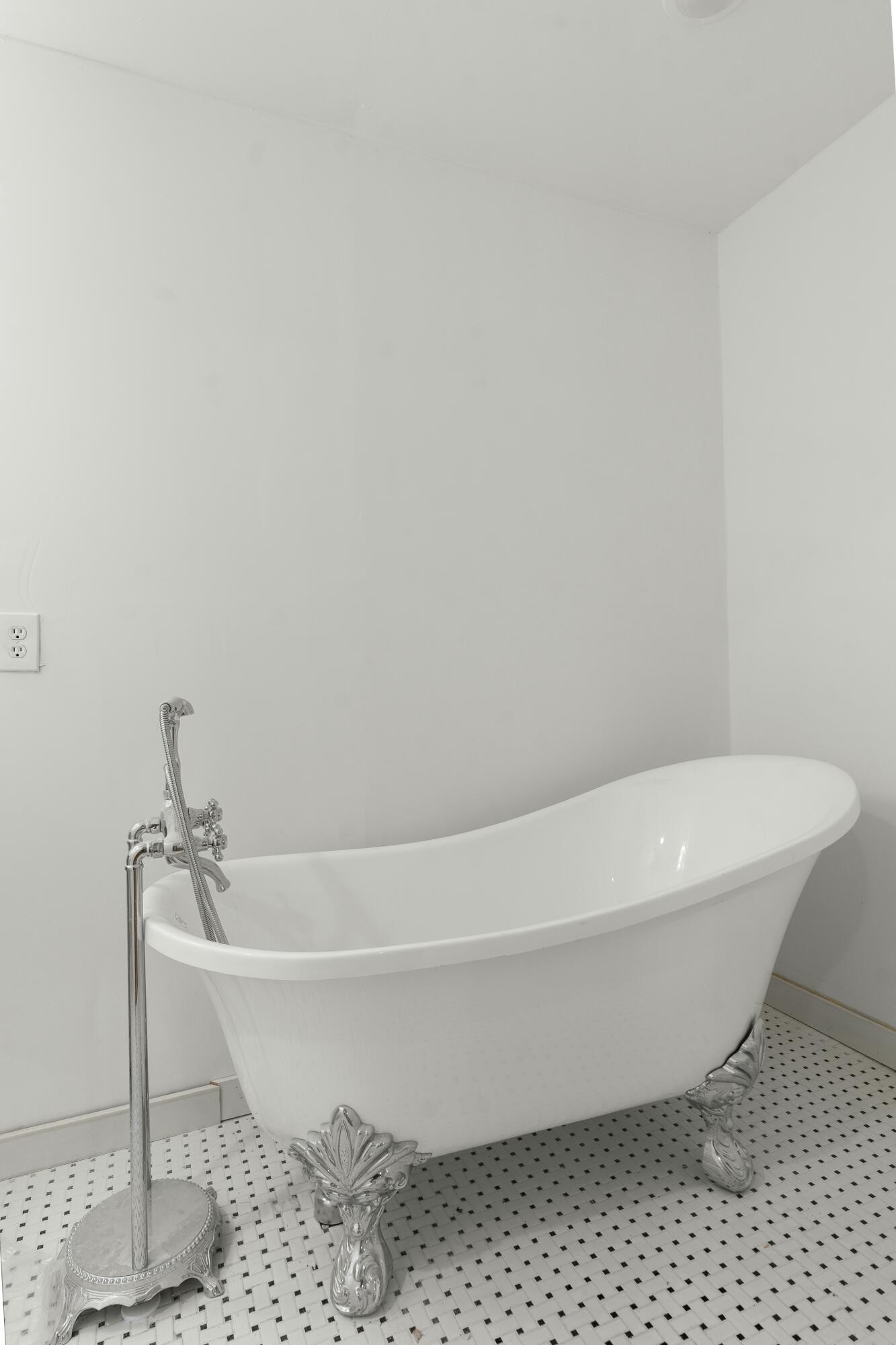 6416 Spring Place Road Southeast Cleveland, TN 37323 - Photo 22 of 28 a white bath tub sitting in a bathroom