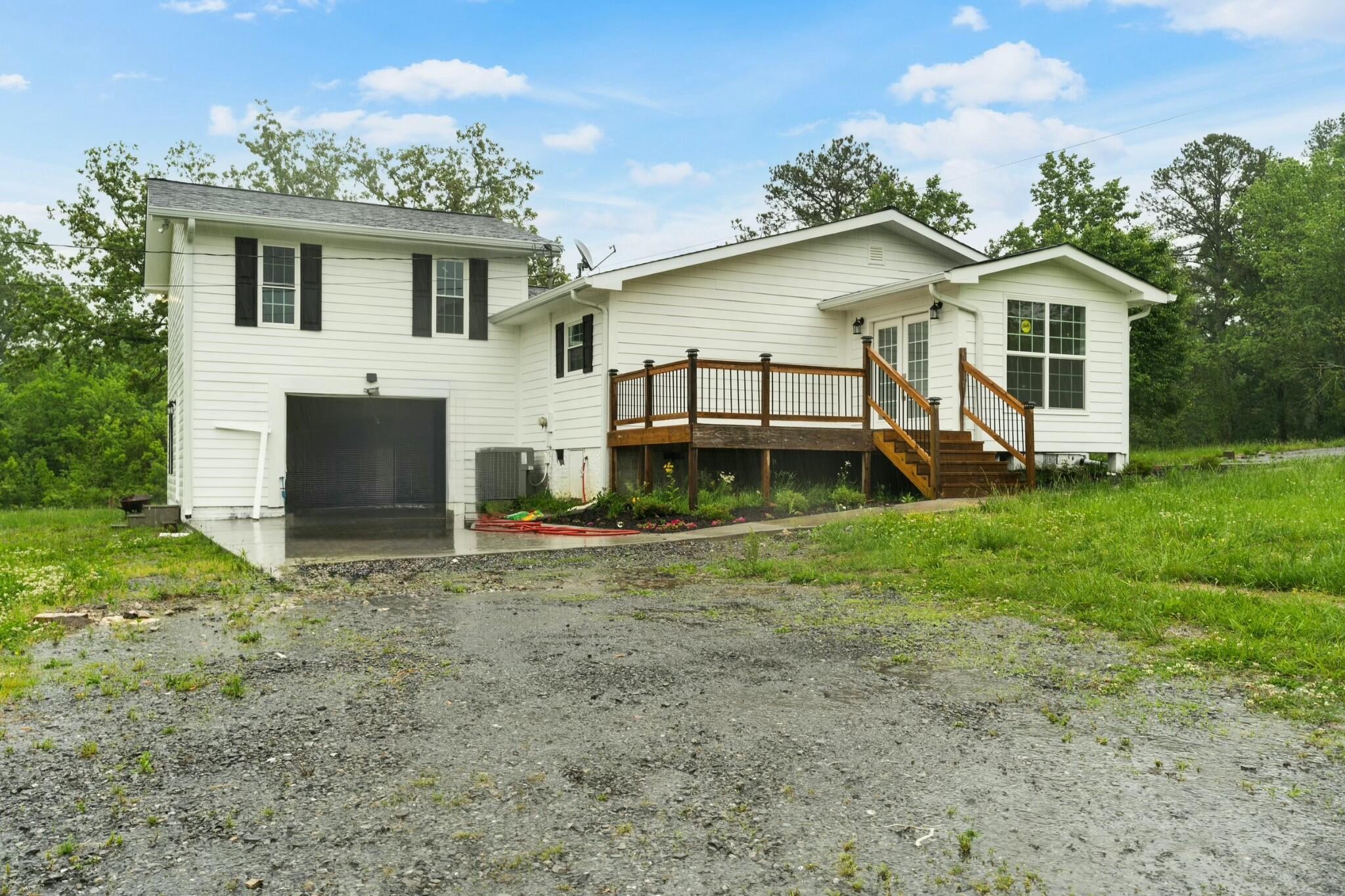 6416 Spring Place Road Southeast Cleveland, TN 37323 - Photo 27 of 28 a front view of a house with garden