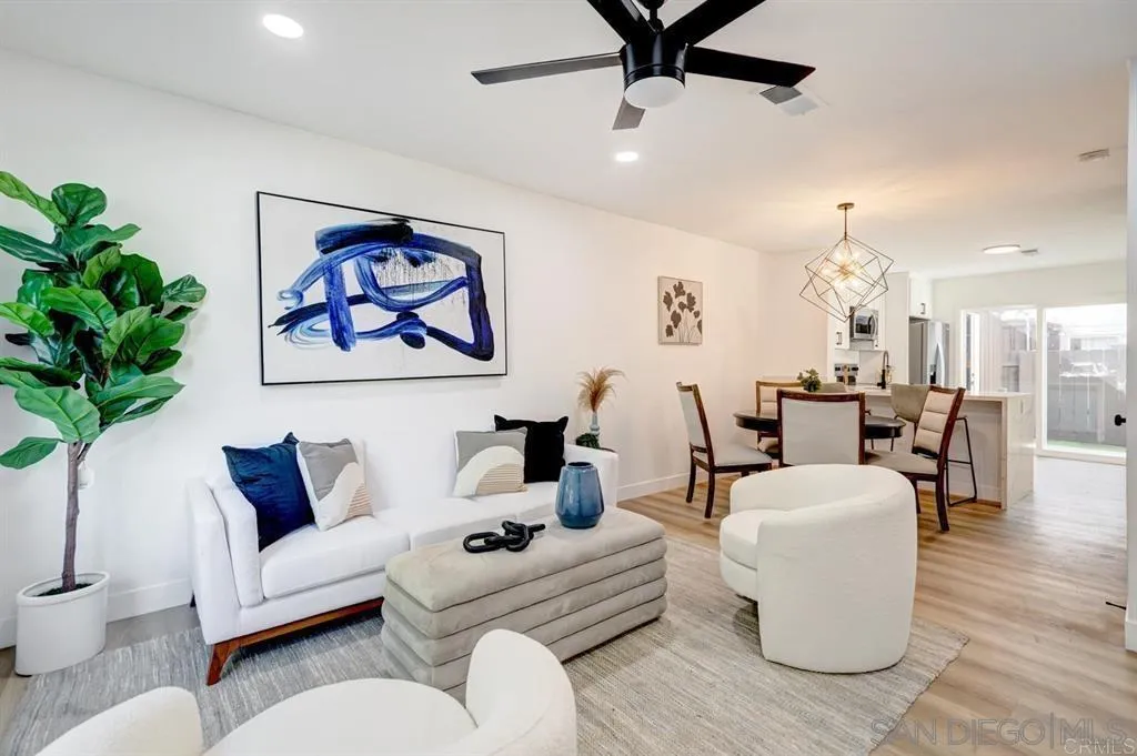 10135 Peaceful Court Santee, CA 92071 - Photo 14 of 24 a living room with furniture and a chandelier