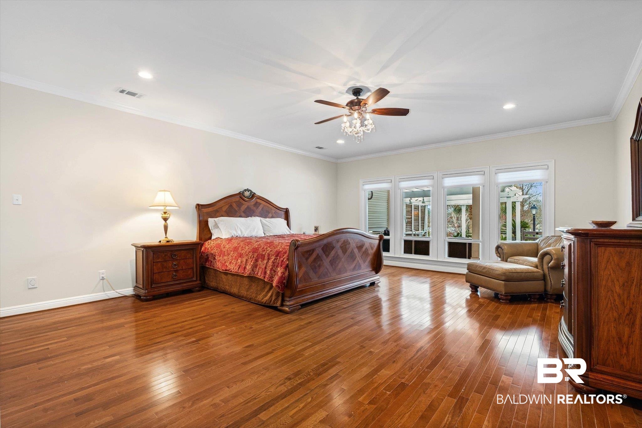 4851 Audubon Drive Mobile, AL 36619 - Photo 13 of 46 Bedroom featuring ornamental molding, hardwood / wood-style flooring, recessed lighting, a ceiling fan, and a baseboard heating unit