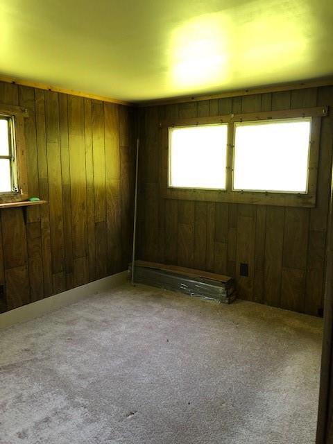 92 Rowitsch Road Stoneboro, PA 16153 - Photo 4 of 7 an empty room with windows