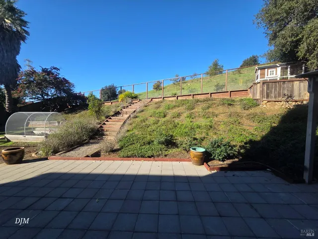 a view of swimming pool from a balcony