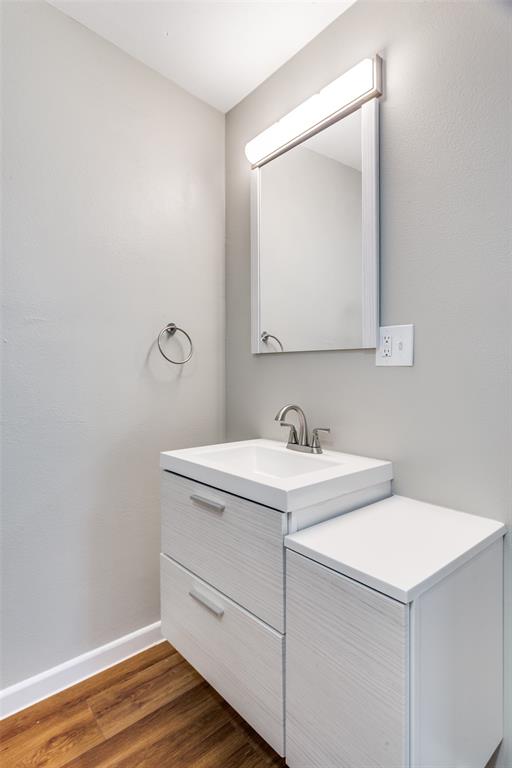 4045 Carolyn Road Fort Worth, TX 76109 - Photo 19 of 28 a bathroom with a sink and a mirror