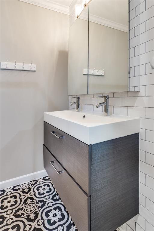 4045 Carolyn Road Fort Worth, TX 76109 - Photo 21 of 28 a bathroom with a sink and a mirror