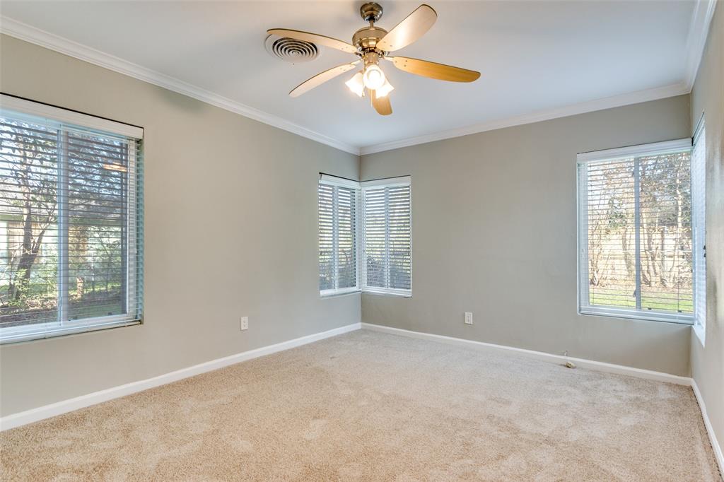 4045 Carolyn Road Fort Worth, TX 76109 - Photo 22 of 28 a view of a room with windows and chandelier fan