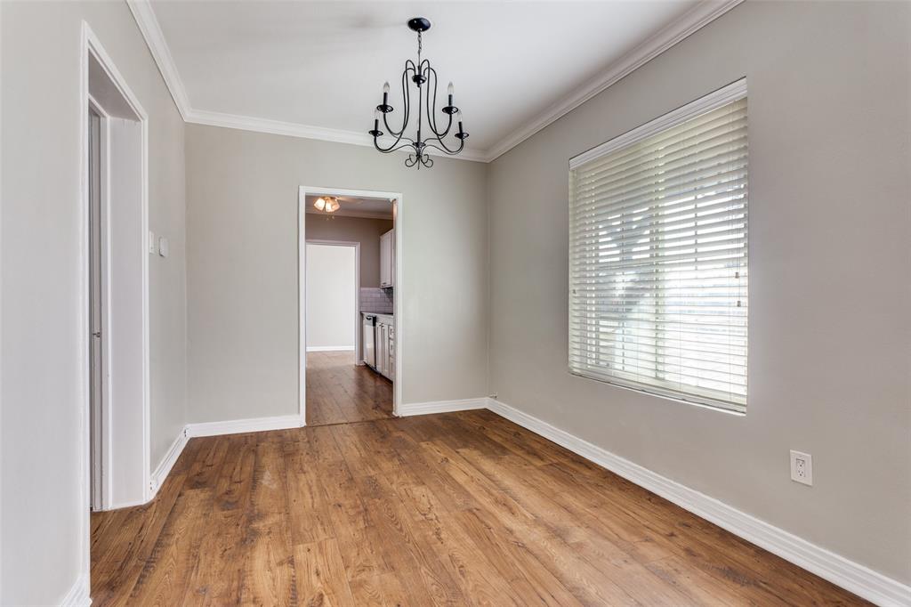 4045 Carolyn Road Fort Worth, TX 76109 - Photo 6 of 28 a view of empty room with wooden floor and fan
