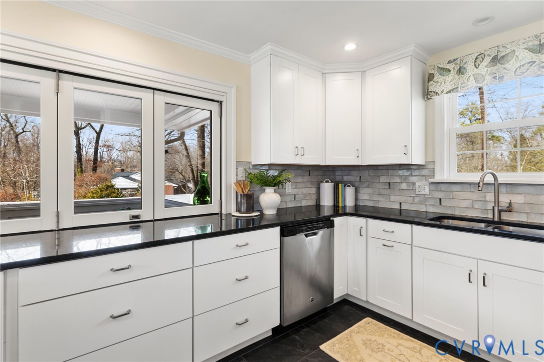 8678 Fieldcrest Road Richmond, VA 23235 - Photo 12 of 52 Beautiful granite counters, custom tile backsplash