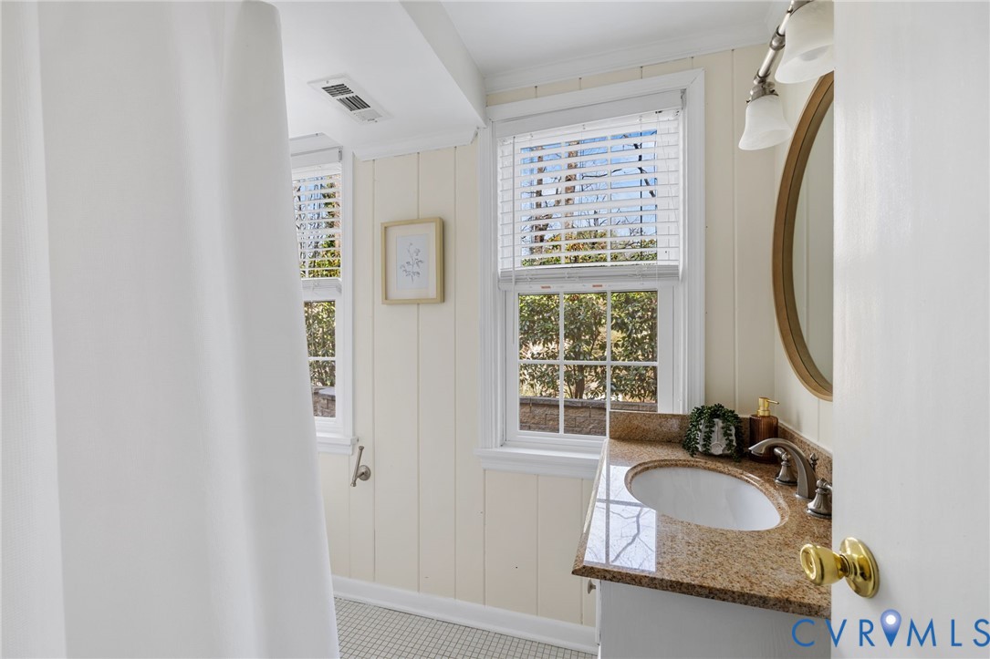 8678 Fieldcrest Road Richmond, VA 23235 - Photo 38 of 52 Ensuite Bath - window overlooks rear patio. This