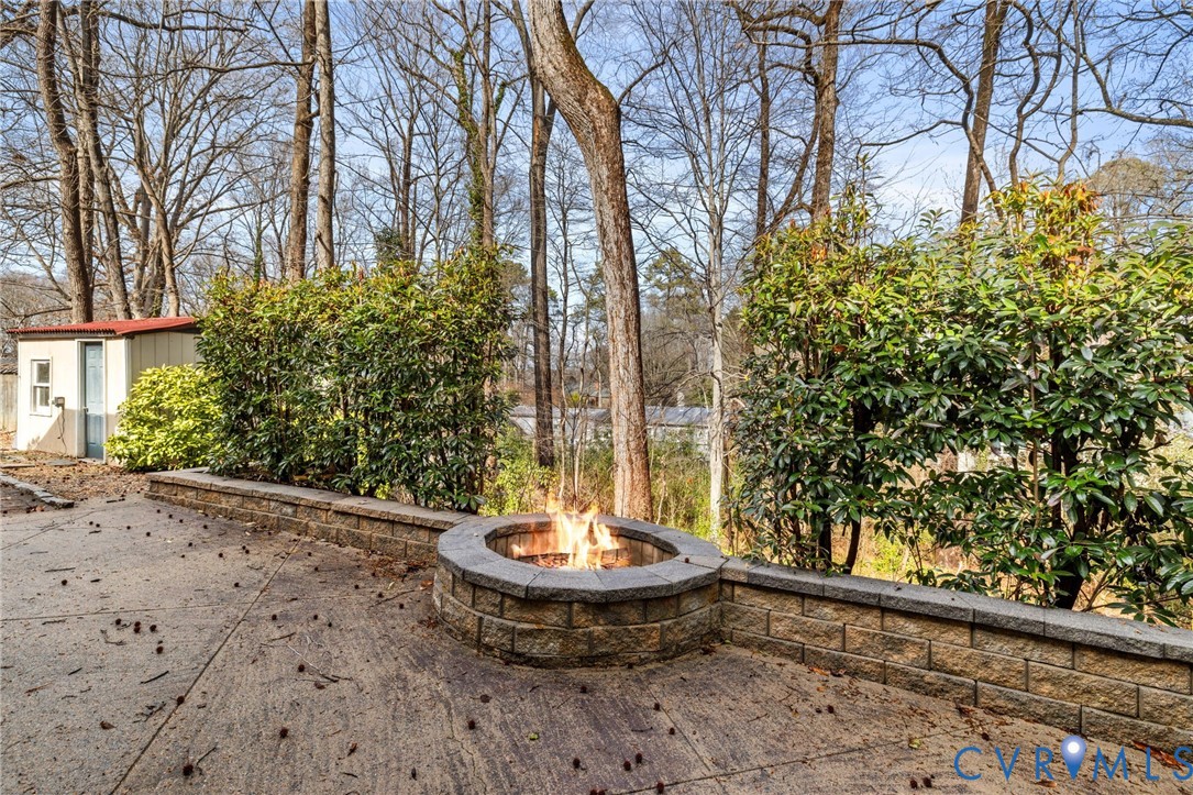 8678 Fieldcrest Road Richmond, VA 23235 - Photo 46 of 52 Built-in open firepit on the rear patio - cozy spo